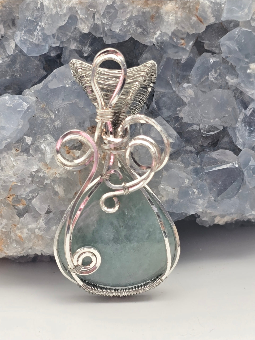 Aquamarine Pendant Wrapped In Silver-Plated Copper Wire