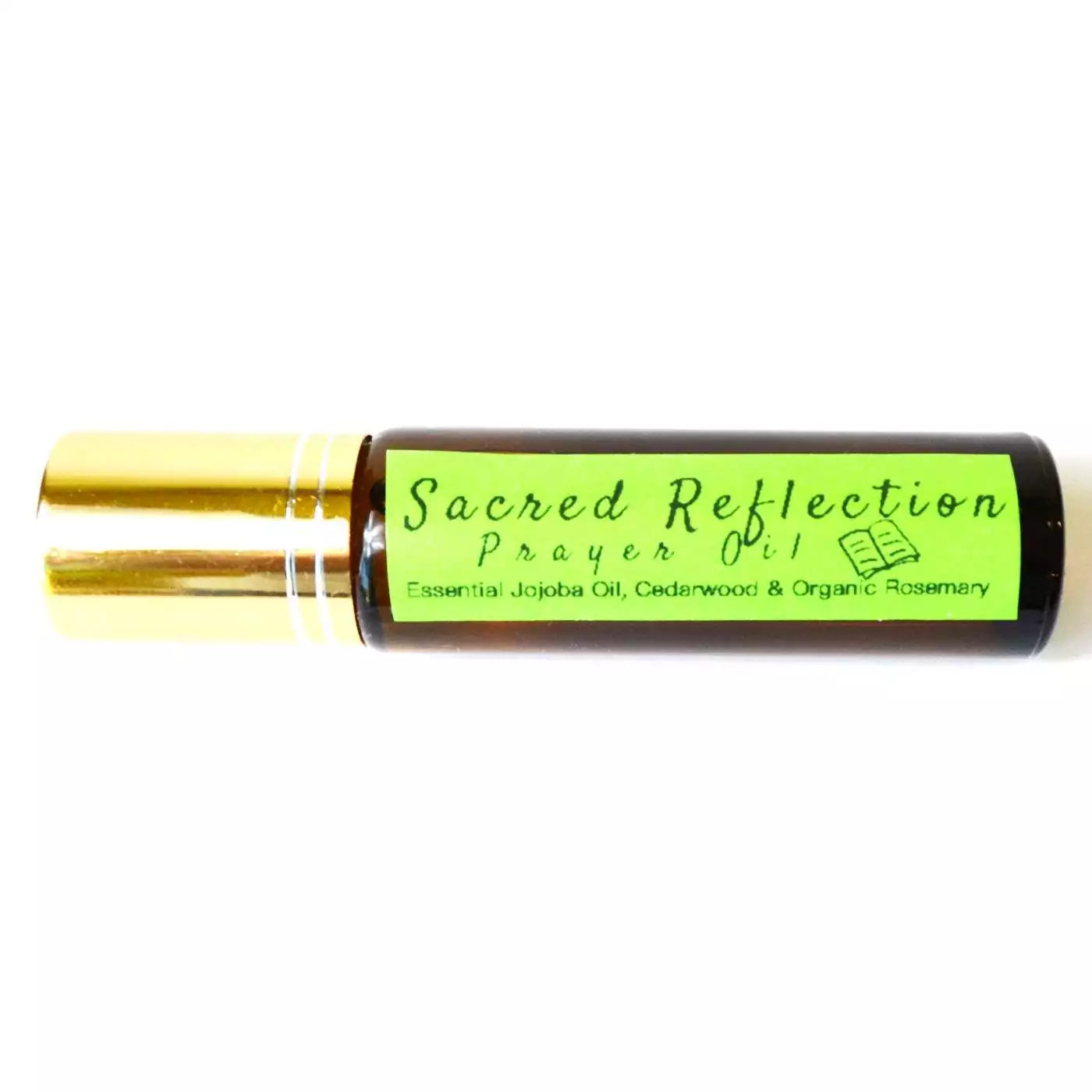 Small 10ml amber glass bottle labeled Sacred Reflection Prayer Oil placed on a plain background.