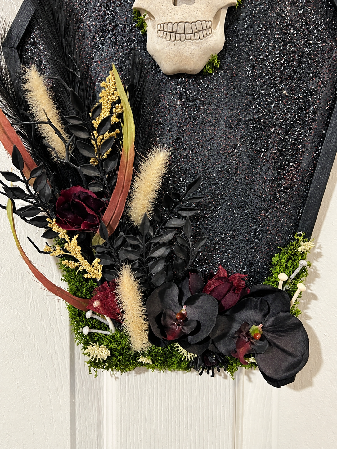 Gothic coffin floral skull wall hanging