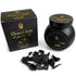 Jar of Sonavi Desert Oud bakhoor incense chips next to its decorative box, with small oud wood pieces scattered around — 40g natural agarwood blend inspired by desert nights.