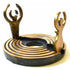 Dearinth Mini Altar: a round bronze-toned labyrinth base of concentric raised ridges with two upright cut-out figures, the Goddess and the God, arms raised in crescents, around an open center.