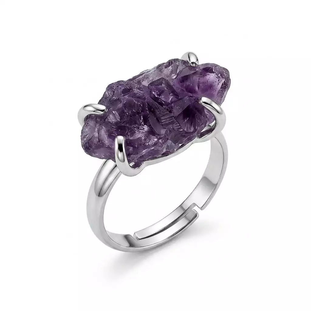 Amethyst adjustable crystal ring with a rich purple stone set on an open silver-toned band displayed on a white background