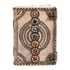 Decorative leather-bound journal with chakra gemstone inlays and intricate tooled patterns on the cover — dual metal clasp closure.