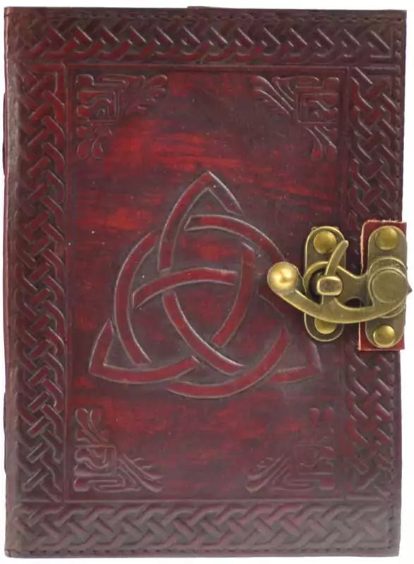 Triquetra embossed leather blank journal with metal latch closure showing Celtic trinity knot design on cover, ritual writing book for Book of Shadows and grimoire