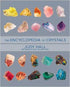 Encyclopedia of Crystals by Judy Hall — large illustrated reference book cover showing colorful gemstone photography for this comprehensive crystal guide.