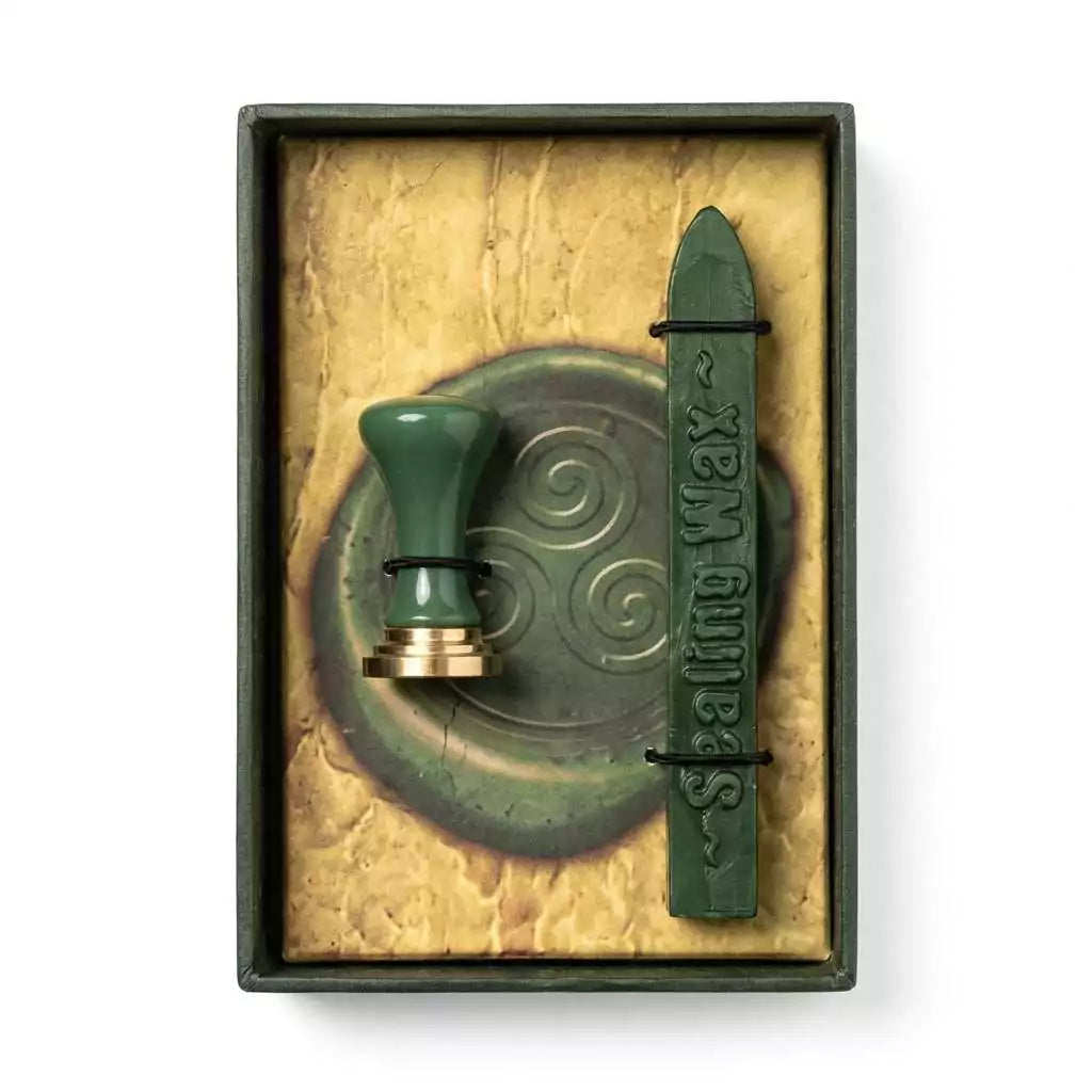 Triskelion sealing wax kit with green wax stick and Celtic triple spiral stamp for ritual letter sealing sacred correspondence and ceremonial document magic