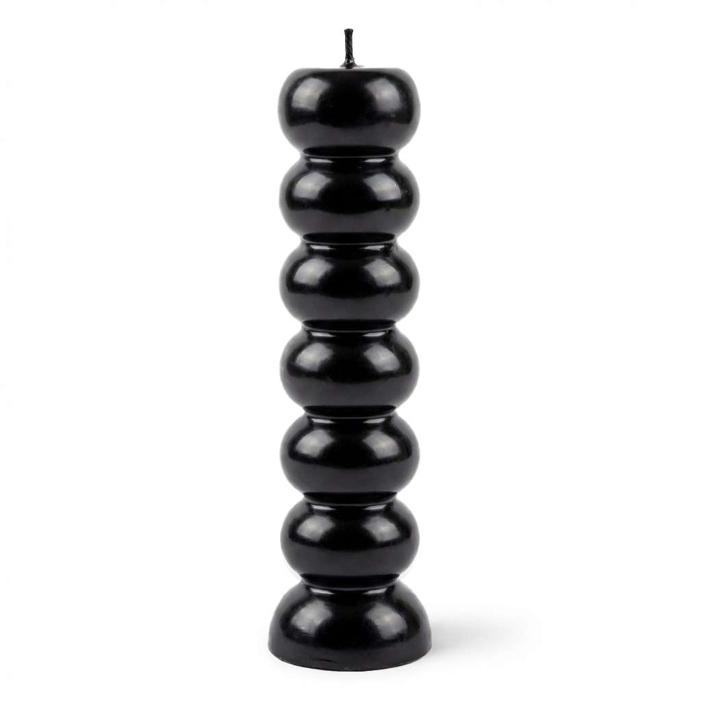 Black seven-knob banishing ritual candle with seven sections for burning one per day to progressively remove obstacles and clear blockages over a week