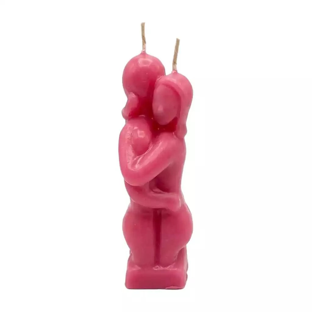 5-inch pink wax lovers figure candle depicting two figures embracing, with two wicks on top, for romance and love rituals.