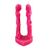 Pink wax candle sculpted as two stylized figures facing each other on a heart-shaped base, for sweet love attraction and new romance hoodoo ritual use.