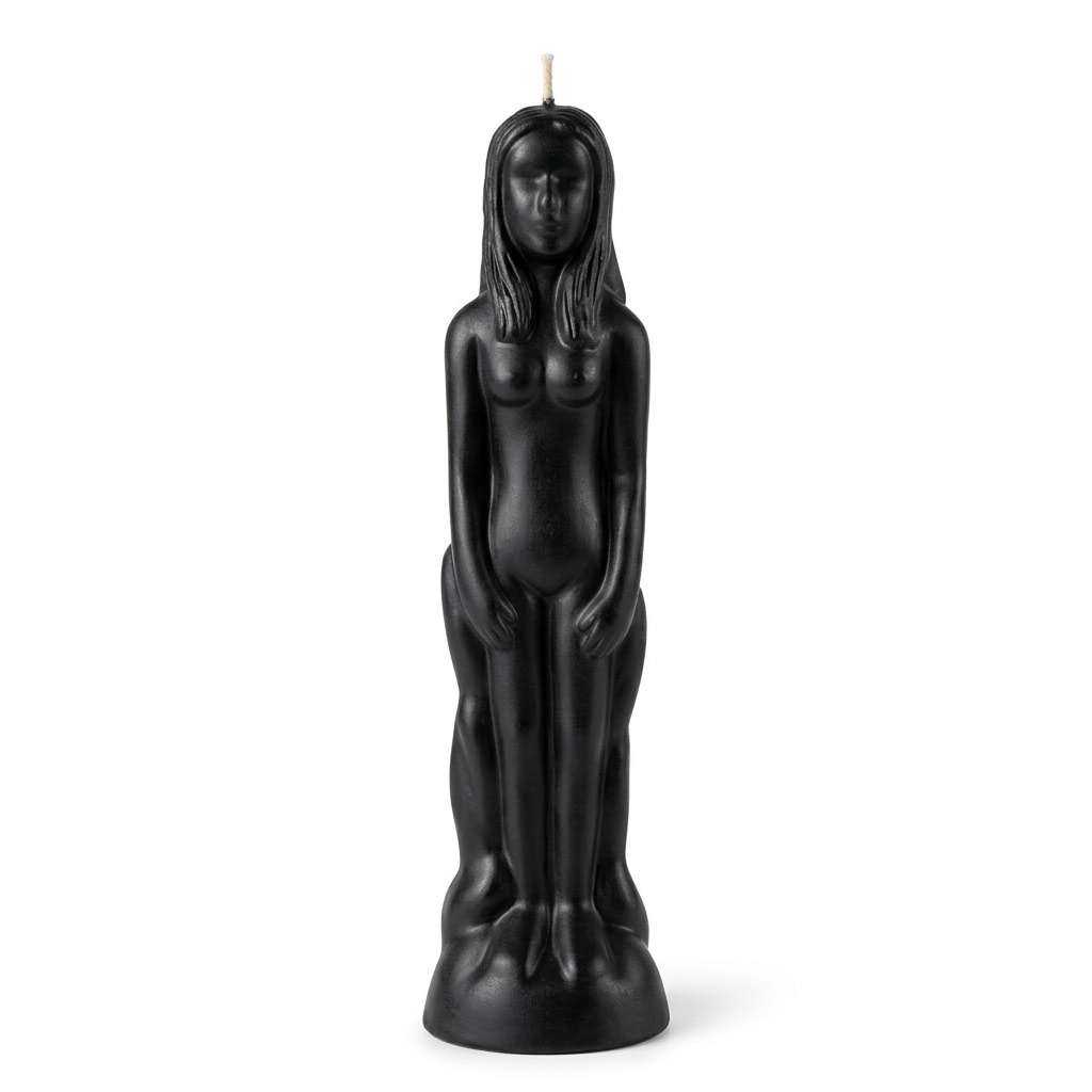 Black wax candle sculpted as a standing female figure with long hair and a wick at the top, for hoodoo protection, banishing, and strength rituals.
