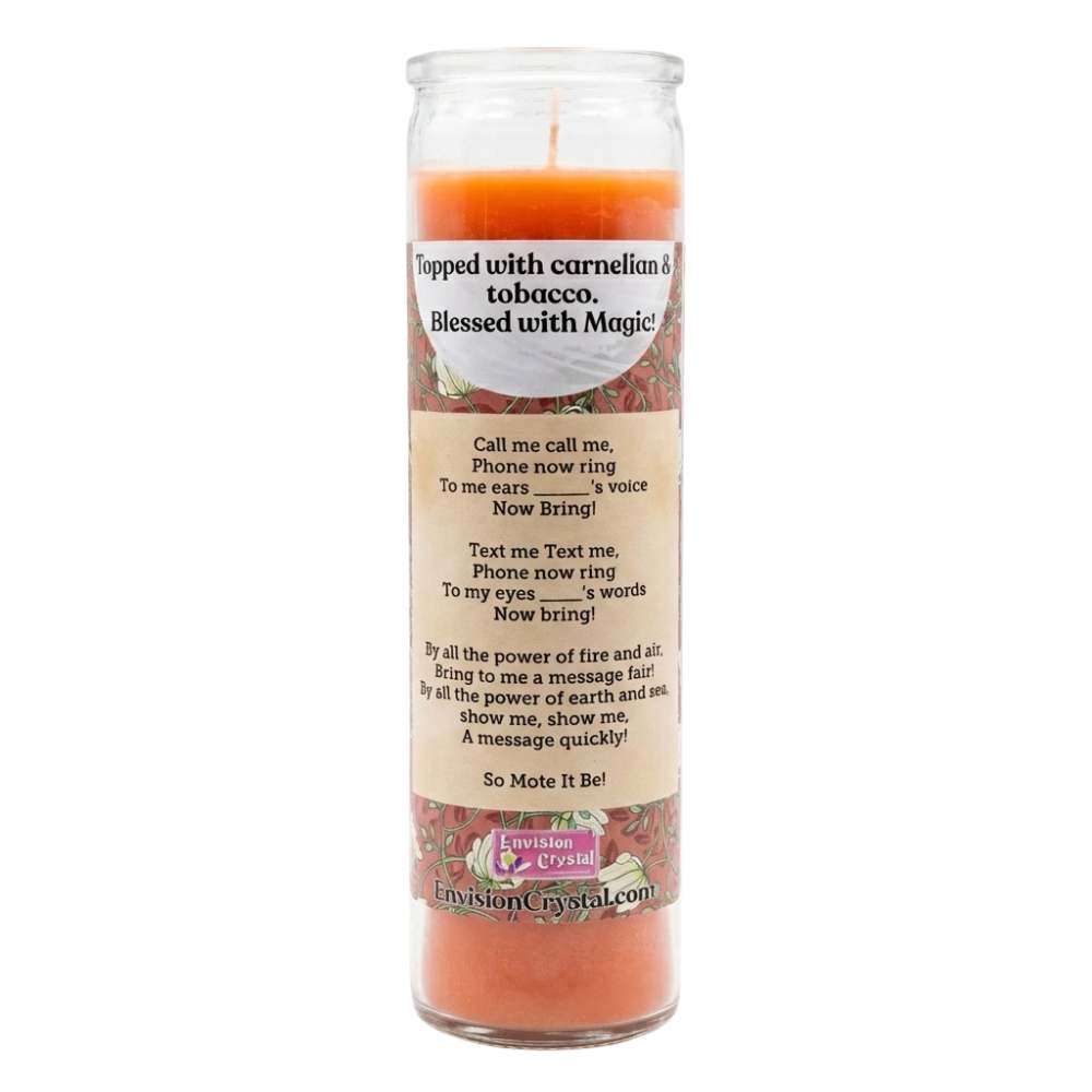 Tall orange ritual candle with prayer label indicating carnelian and tobacco contents — intent-focused candle for drawing communication and positive energy.
