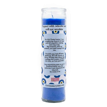 Blue candle in clear glass container with Evil Eye Protection label for warding against jealous and harmful attention