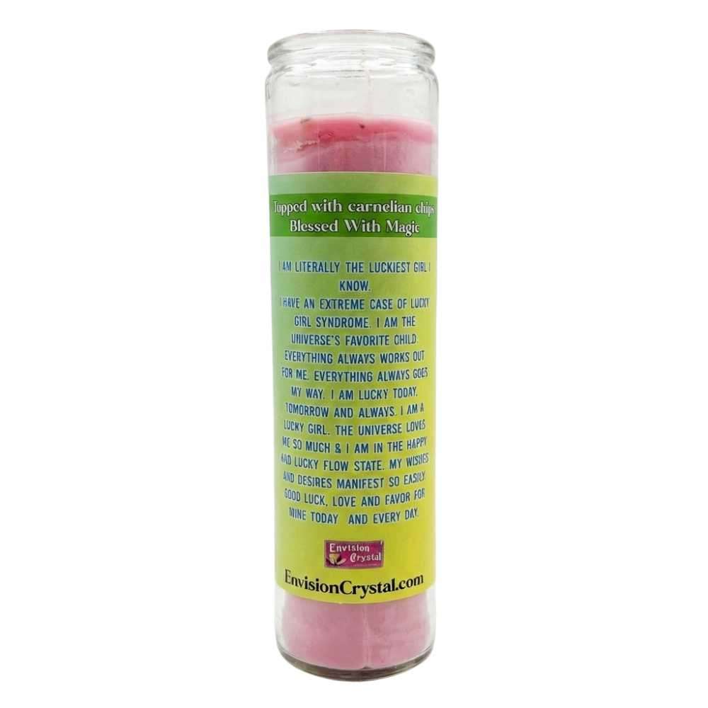 Tall glass candle with pink wax top and Lucky Girl Syndrome manifestation label for abundance and good fortune ritual