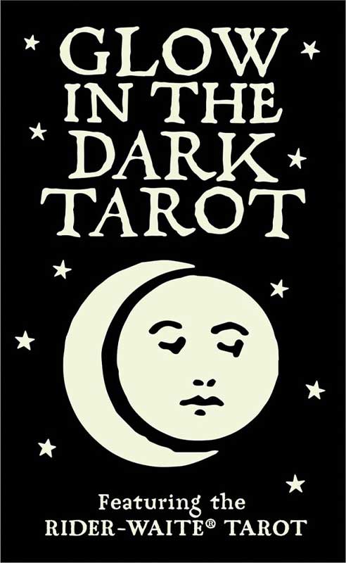 Glow in the Dark Tarot box cover featuring bold white text on black with a stylized moon and face design and scattered stars.