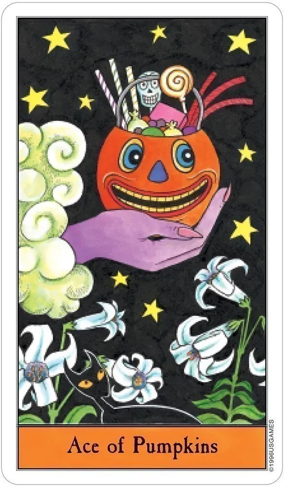 Ace of Pumpkins card from the Halloween Tarot by Kipling West, a hand holding a candy-filled jack-o-lantern