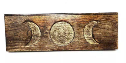 Triple Moon tarot card holder with tarot card displayed in stand showing lunar altar display piece