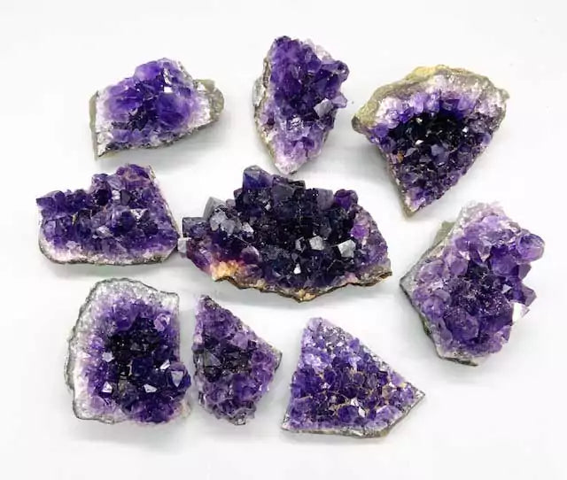 Natural amethyst druse cluster formations showing sparkling purple crystal points on matrix — 1 lb bulk for altar and crystal grid work.