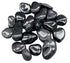 1 pound bag of polished hematite tumbled stones in metallic gray showing natural iron-rich luster, used for grounding and protection crystal work.