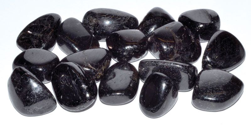 One pound polished hypersthene tumbled stones showing dark grey stone with bronzy metallic schiller sheen for psychic insight bulk lot