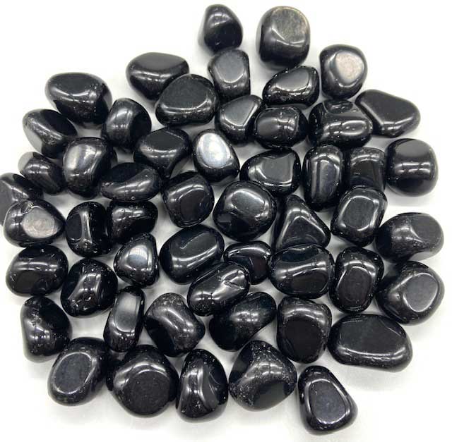 Black obsidian tumbled stones 1 lb bulk — smooth polished jet-black volcanic glass pieces for protection, shadow work, and psychic shielding.