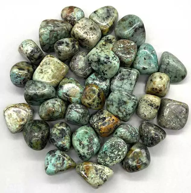 One pound bulk supply of smooth turquoise tumbled stones in sky blue-green for crystal grids and protection