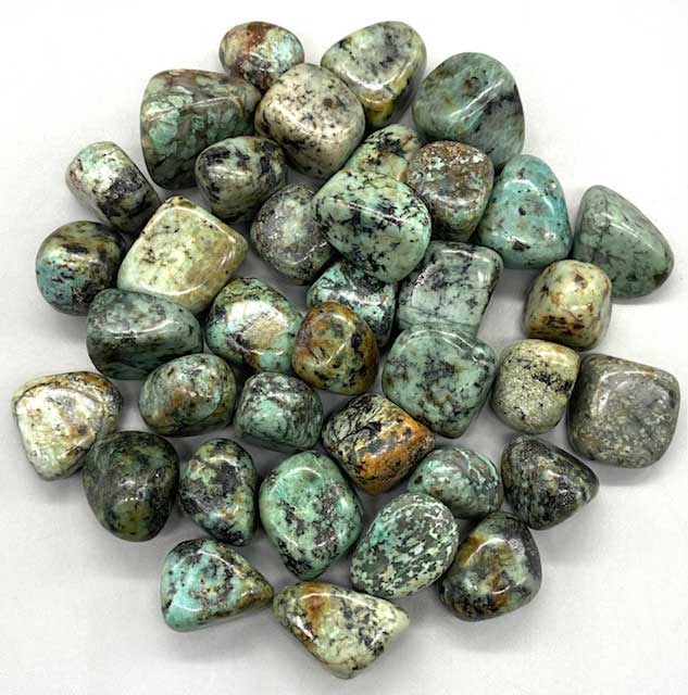 One pound bulk supply of smooth turquoise tumbled stones in sky blue-green for crystal grids and protection