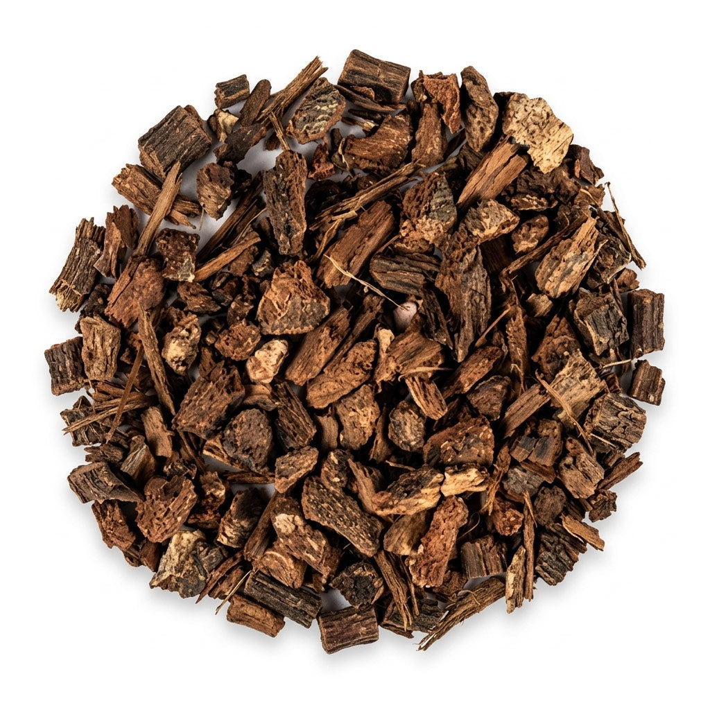 White oak bark dried herb showing finely chopped brown herbal material in a small pile on white background