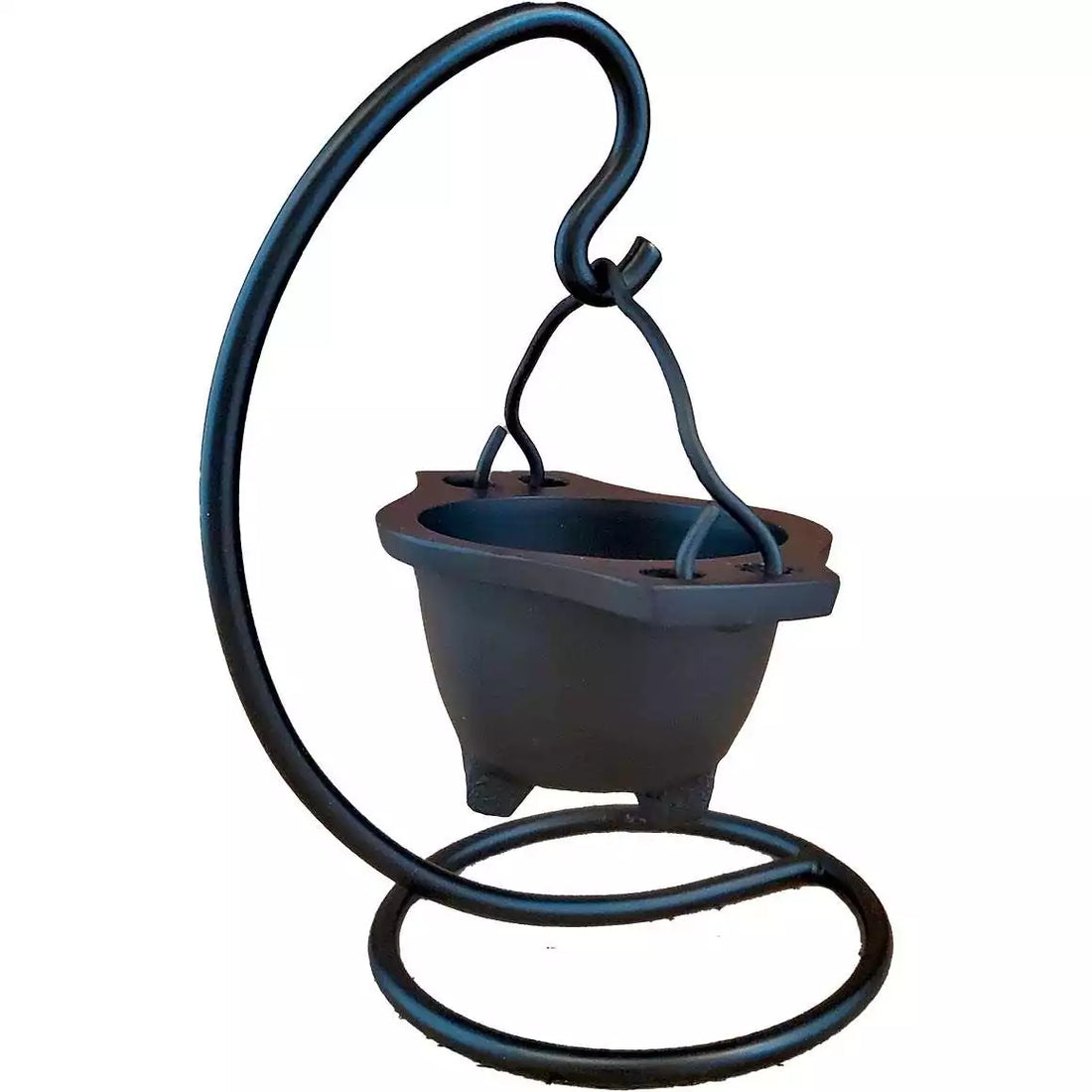 Black cast iron hanging cauldron on a curved iron stand — showing the suspended ritual cauldron in full-height display for altar use.