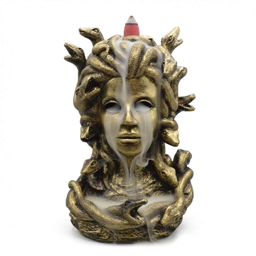 Detailed resin sculpture of Medusa with snakes for hair designed as backflow incense burner with atmospheric smoke cascading