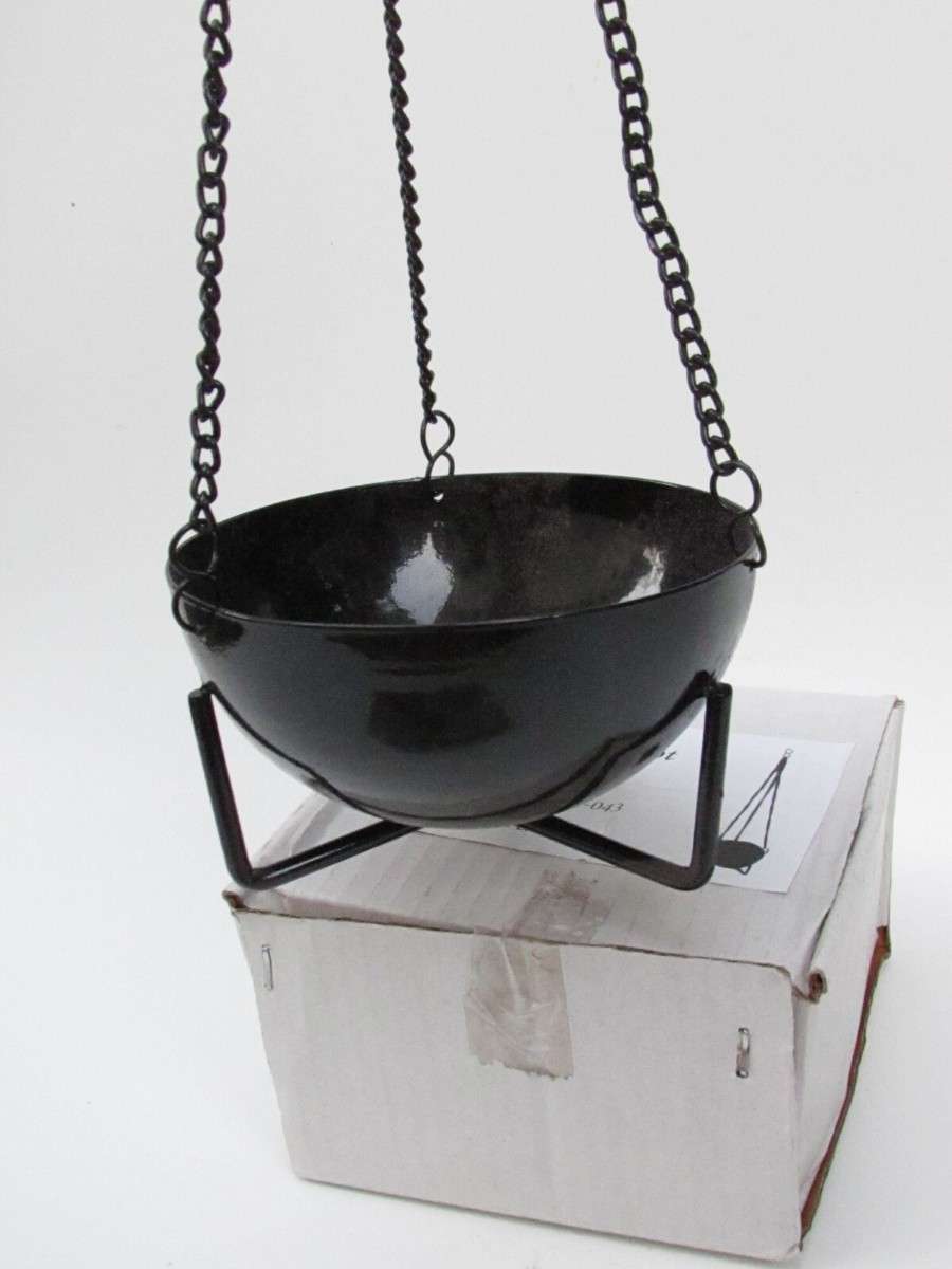 3.5-inch black cast iron hanging cauldron incense burner suspended by chains over a white box for scale.