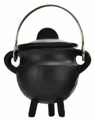 Small black cast iron lidded cauldron with handle resting on three legs — plain finish mini witch&