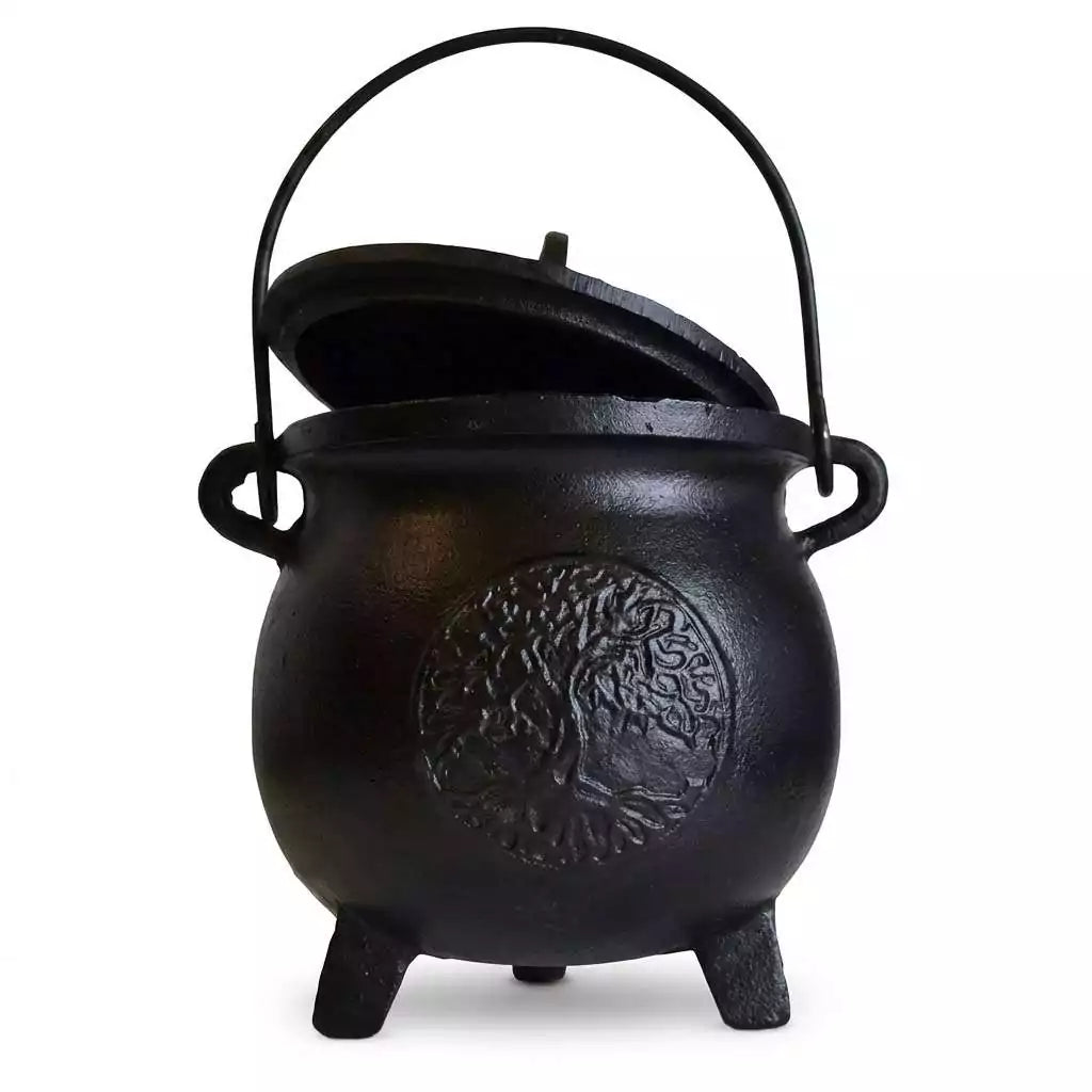 Tree of Life cast iron cauldron with lid — 6-inch black iron cauldron with embossed tree design, fitted lid, and bail handle.