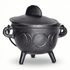 5-inch black cast iron Triple Moon cauldron with fitted lid and three legs, showing decorative moon phase engravings around the body.