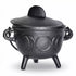 5-inch black cast iron Triple Moon cauldron with fitted lid and three legs, showing decorative moon phase engravings around the body.