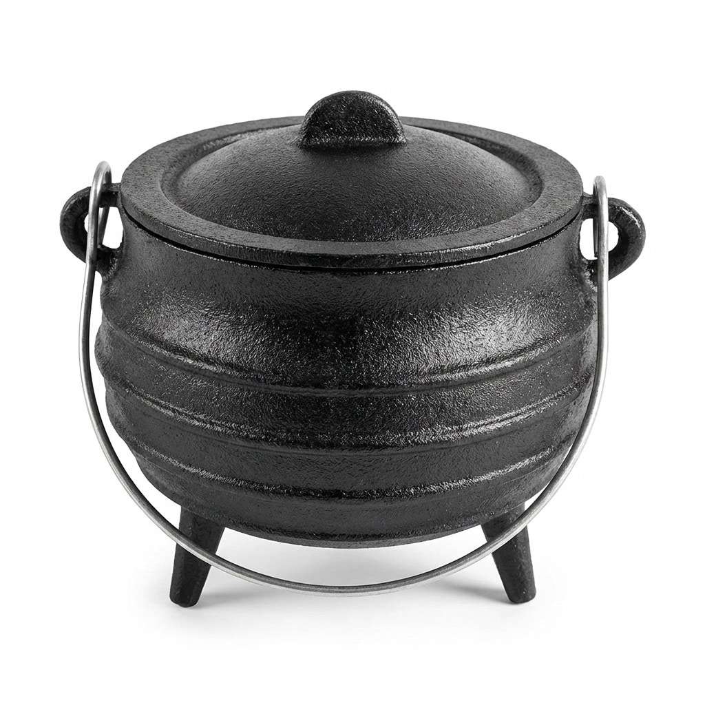 Black 5-inch cast iron cauldron with lid and handle on three legs for burning loose incense smudge herbs charcoal and ritual spell materials on the altar