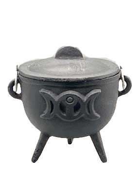 Black cast iron cauldron with a lid, three legs, and Triple Moon decorative symbols embossed on the exterior — Wiccan altar vessel.