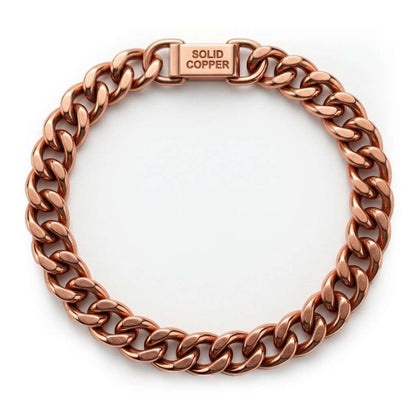 Solid copper link bracelet with interlocking chain links and clasp stamped SOLID COPPER — heavy traditional healing jewelry displayed flat.