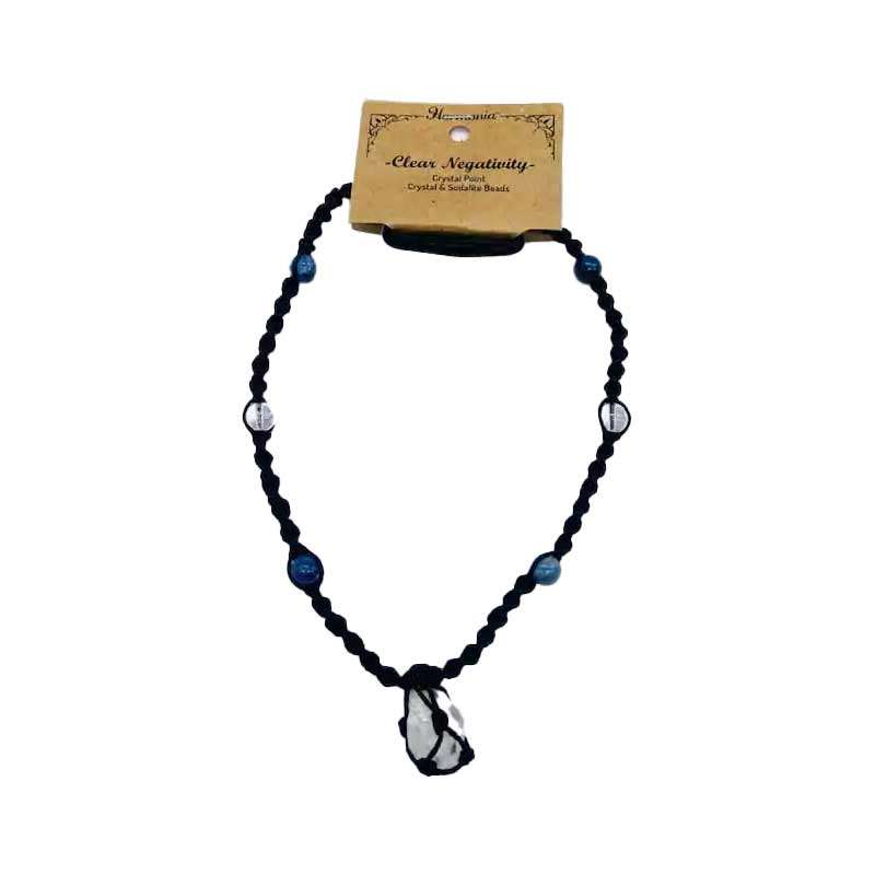 Harmonia beaded necklace with mixed colored beads and a central crystal pendant displayed on a card describing its clearing purpose.