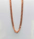 Copper Cuban link chain necklace 24 inch — solid copper interlocking links displayed on a light background showing the bold chain pattern.