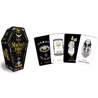 Macabre Tarot coffin-shaped box with black and white illustrated cards spread around it showing gothic skull and mystical character designs.