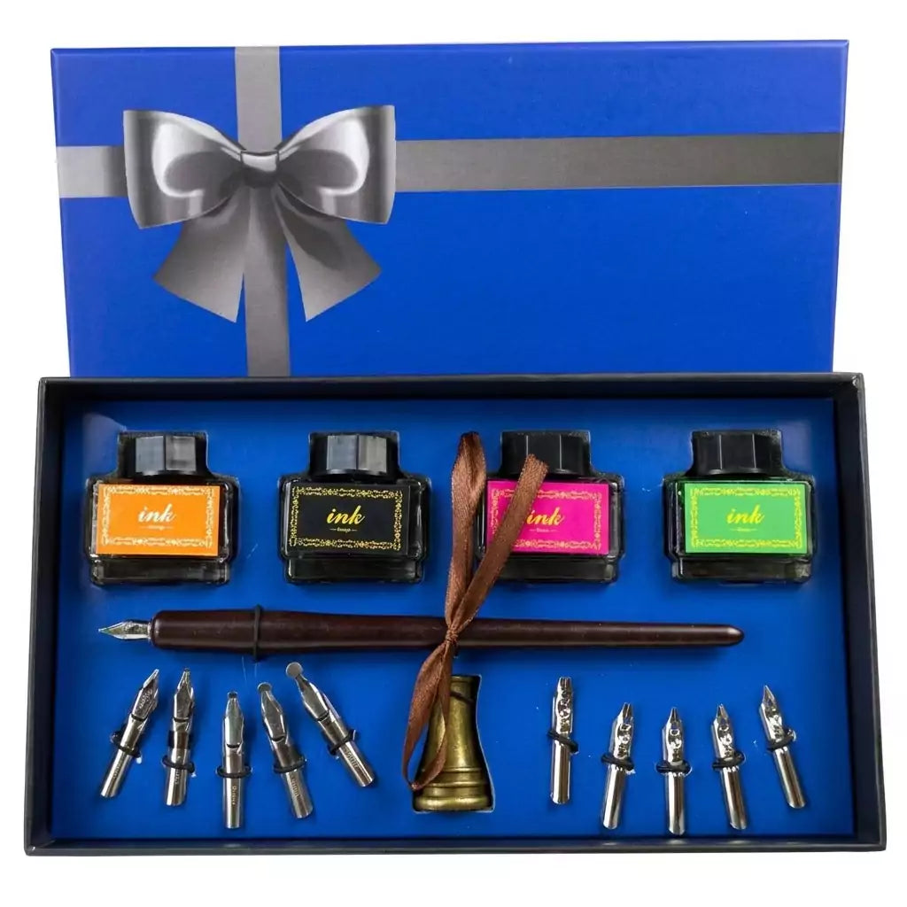 Ritual pen kit with pen and writing accessories for spellwork and sigil crafting, laid out on a flat surface