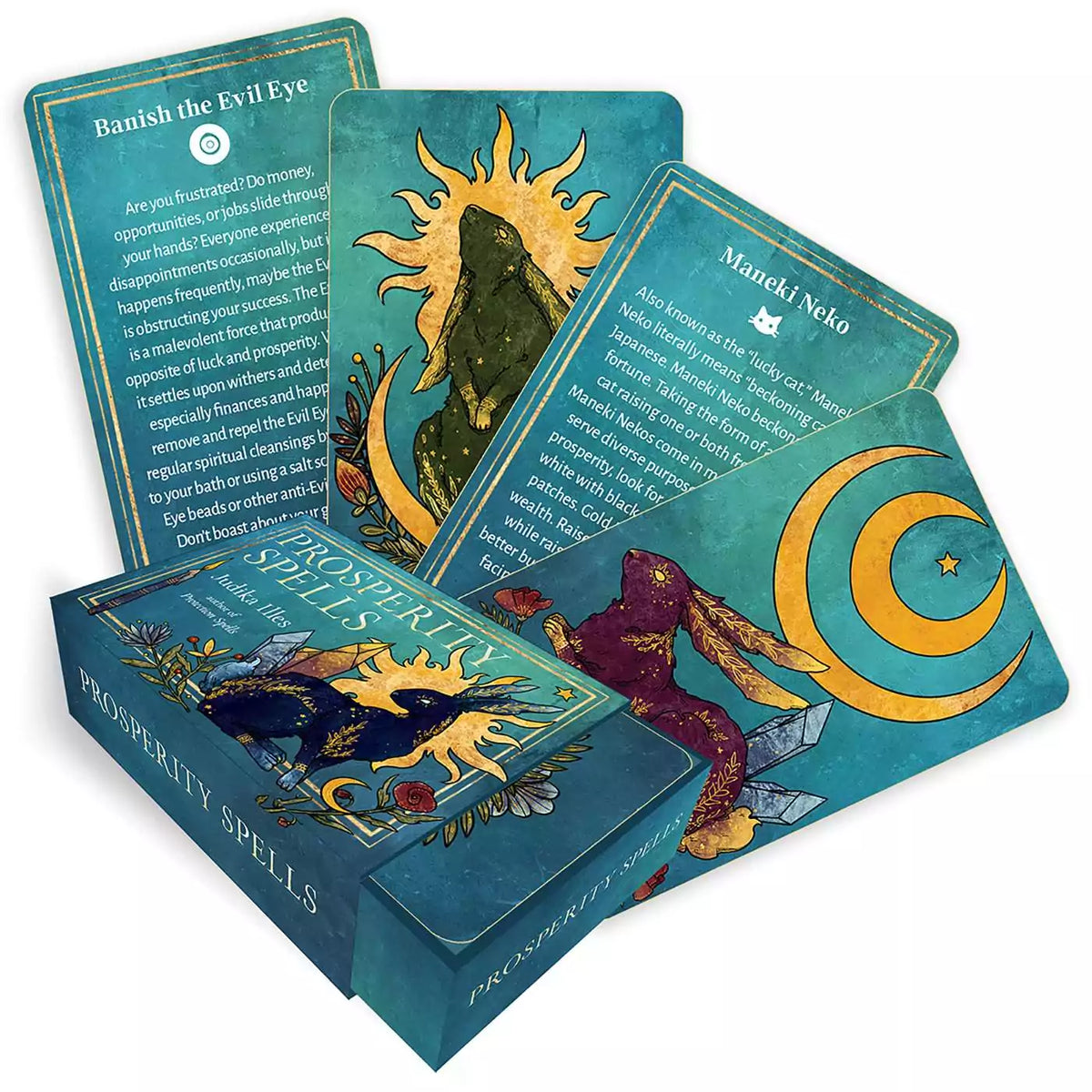 Prosperity Spells card deck by Judika Illes showing the boxed set and a fan of gilt-edged cards with gold-trimmed illustrated spell cards for wealth and abundance magic