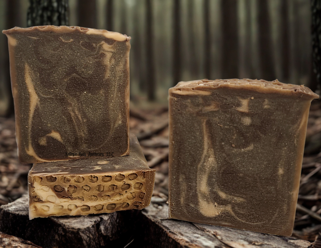 Grounding collection - three honey and goat milk soap bars with honeycomb texture on top.