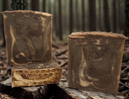 Grounding collection - three honey and goat milk soap bars with honeycomb texture on top.