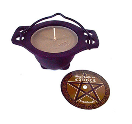 Sandalwood candle in cauldron