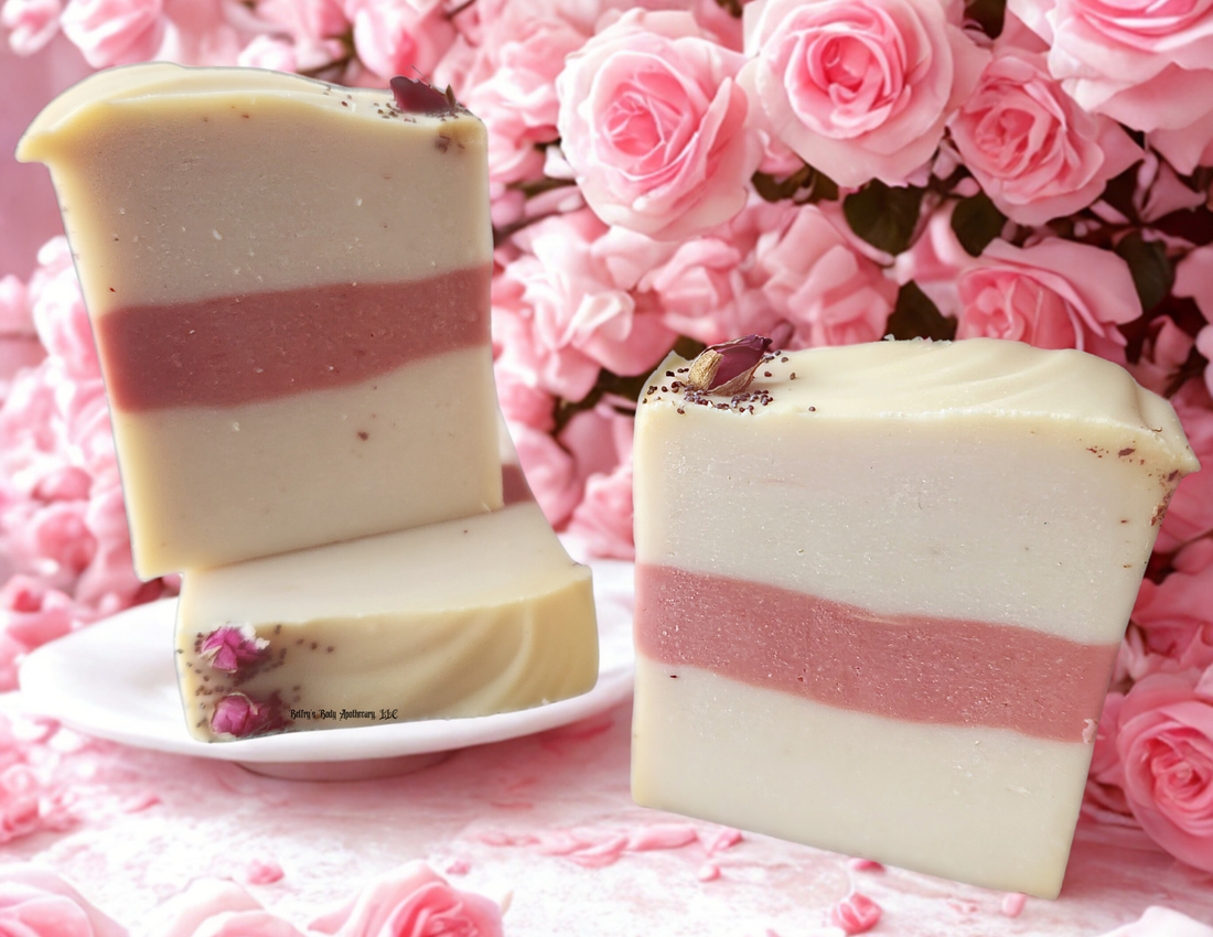 Grounding collection - three soap bars containing white kaolin clay and French pink clay with rosebuds and poppy seeds on top
