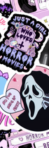 Sticker pack with horror movie-themed designs on a pink background