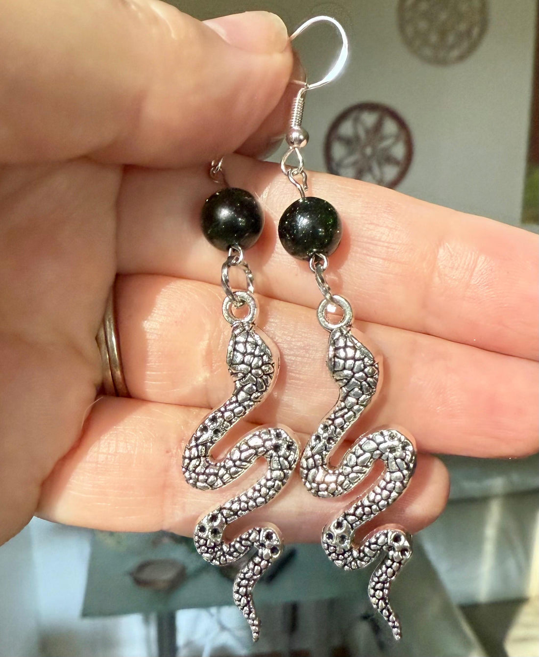 Medusa Silver Serpent Earrings with Shimmery Green Goldstone Gemstone.