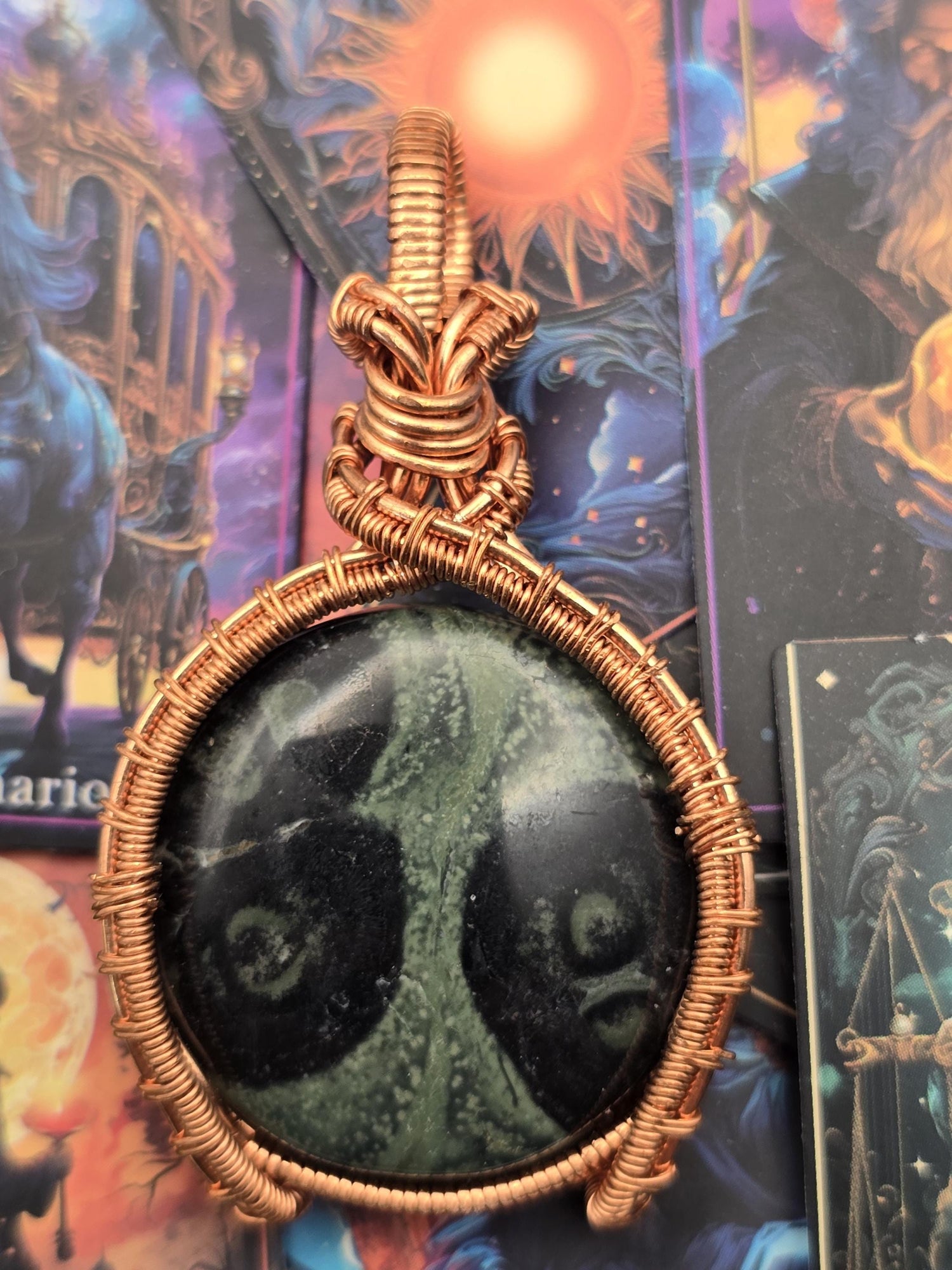 Hand-crafted Wire Wrapped Kambaba Jasper Crystal Pendant
