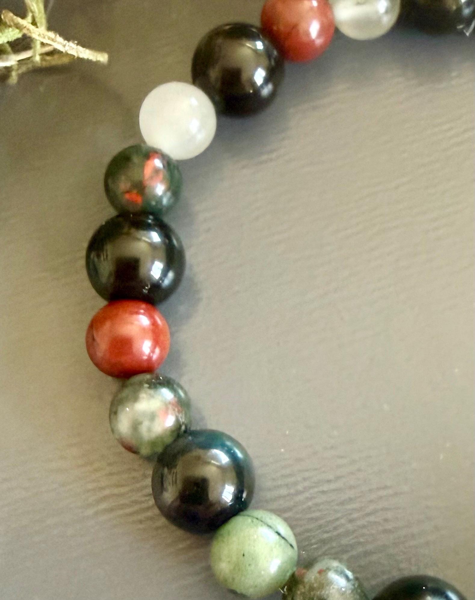Dragon Bloodstone Jasper Bracelet with Pentacle Charm.